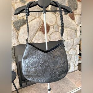 Hand tooled leather shoulder bag